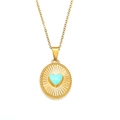 Detailed close-up of 18K gold-plated oval pendant with a blue heart center and sunray texture - Gold Blue Enamel
