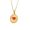 Macro view of vintage 18K gold-plated oval pendant with 3D red heart and sunburst texture - Gold Red Oil Drip