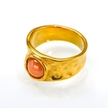 Detailed view of hammered gold stainless steel ring with a round orange natural stone - Gold Orange Ceramic