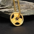 Macro view of golden barbell weight plate pendant engraved with Go Fit on grey stone - Single Pendant (No Chain) / Gold