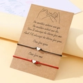 Détail des bracelets cœur tressés rouge et noir sur carte avec illustration de promesse - Rouge & Noir