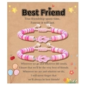 Dettaglio di braccialetti dell'amicizia in perline d'argilla rosa e bianca con nodi - Migliore Amico Rosa
