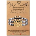 Detail of adjustable sun and moon woven bracelets on a kraft display card with soft clay beads - Black White Gold Style (B00751)
