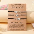 Detailed view of heart-shaped sun, moon, and star charms on adjustable black woven ropes - Pinky Promise Heart Style (B00536) / Set of 3 / Black