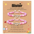 Roze hart knoop armbanden op een geschenkkaart voor zussen met verstelbaar koord - Zus / Roze Staalkleur