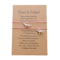 Rosa Dinosaurier-Armband-Set auf Back-to-School-Geschenkkarte für Kinder und Eltern - Rosa