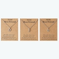 Detailed view of sun, moon, and star friendship necklaces on Kraft display cards - Best Friend Card Style (N00064)