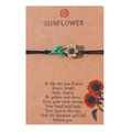Detail of sunflower charm bracelet with black braided cord on a kraft gift card - Black Cord-Green Stem