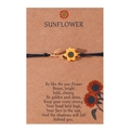 Detail of yellow enamel sunflower charm on hand-woven black cord with kraft card - Black Cord-Gold Flower
