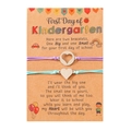 Detail of handmade woven bracelets with heart charms on kindergarten themed display card - Kindergarten Purple Blue Thread