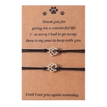 Handmade woven paw print friendship bracelet set on sentimental memorial card - Black Thread