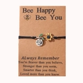 Handmade sunflower bracelet with Bee Happy pendant on inspirational message gift card - Black