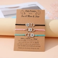 Three-piece set of woven friendship bracelets with sun, moon, and star metal charms - Pinky Promise Style (B00536) / Set of 3 / Multicolor