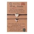 Bracelet tressé noir pour élève de CM1 avec pendentifs dinosaures sur carte - Style Dinosaure Noir (B00490B Paire Œuf Dinosaure Raptor)