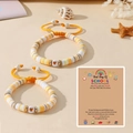 Détail de bracelets en perles Heishi avec cœur et carte de message de rentrée scolaire - Jaune (Thème École)