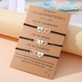 Lot de trois bracelets de vœux soleil lune et étoile avec pendentifs cœur sur carte - Style de Coeur 3 Générations (B00536) / Lot de 3 / Noir