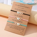 Détail de trois bracelets de génération avec cœurs gravés soleil lune et étoile - Style de Coeur 3 Générations (B00536) / Lot de 3 / Multicolore