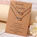 Set de colliers d'amitié argentés avec pendentifs nœud de cœur sur carte cadeau - Collier Et Carte / Thème Amitié Acier