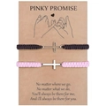 Détail de bracelets de couple tissés avec croix argentées sur carte Pinky Promise - Thème Promise (Noir et Rose)