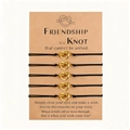 Adjustable black friendship bracelets with gold heart knots on a gift display card - Gold (B00737 Quint Set)