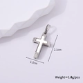 Detailed view of a silver cross pendant with white inlay showing 2.1cm by 1.2cm size - Silver Style A