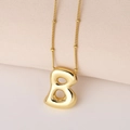 Macro detail of 3D polished golden bubble letter B pendant on a bead chain necklace - Puffy Gold Letter B (Pendant Only (Without Chain))