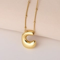 Detailed macro view of a 3D chunky golden letter C pendant on a delicate beaded chain - Puffy Gold Letter C (Pendant Only (Without Chain))