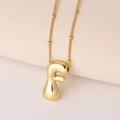 Nahaufnahme des polierten goldenen 3D-Buchstaben F Anhängers mit eleganter Kugelkette - Puffy Goldener Buchstabe F (Nur Anhänger (Ohne Kette))