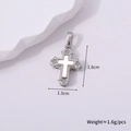 Macro detail of a vintage silver cross pendant with dimensions 1.8cm by 1.3cm - Silver Style D