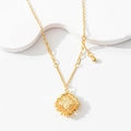 Detail view of hollow geometric gold pendant with CNC embossed texture on mixed chain - 3D Square Bag Necklace