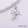 Detail view of small silver cross crucifix pendant measuring 2.3cm by 1.5cm with top loop - Silver Style H