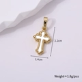 Close-up of a vintage golden cross pendant with white enamel inlay and beaded edges - Gold Style J