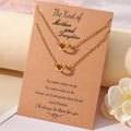 Two-piece gold heart knot necklace set on a mother and daughter sentimental message card - Necklace And Card / Gold Mother Daughter Theme