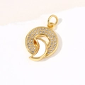 Detail of a gold-plated circular pendant featuring a shell crescent and micro-set cubic zirconia - Pendant Only / Round Moon