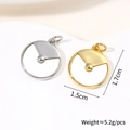 Detailed macro view showing the size and weight of round shell pendant necklace - Plain Round Disc Gold