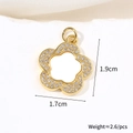 Macro detail of gold flower pendant with zircons and shell petals showing 1.9cm height - Rotating Flower (Natural Shell)