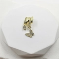 Golden necklace with butterfly and crystal cross pendant on a white geometric stand - Butterfly Pendant