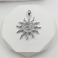 Silver sun flower pendant necklace with white zircons on a white geometric display - Silver Spiral Rhinestone Style (Style B)