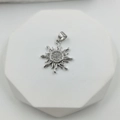 Silver sunburst pendant with sparkling pave crystals and wide bail on white display - Silver Tone Rhinestone Sunburst Style (Style F)