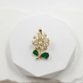 Exquisite rose flower pendant with yellow zircon and green leaf on white pedestal - Rotating Flower Pendant
