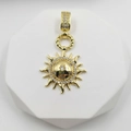 Golden sun flower pendant with sparkling crystals on white hexagonal display stand - Hemisphere Rhinestone Sun Style (Style L)