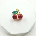Elegant gold cherry pendant with red resin fruits and green leaf zircon stones - Small Cherry Pendant