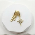Detail of gold-plated charm featuring zircon-set letter H and North Star pendant design - Script Letter H (Style 3)