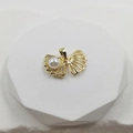 Elegant gold shell pendant with white pearls and diamonds on a geometric stand - Opening Shell Pearl Pendant A