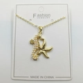 Golden seahorse and starfish pendant necklace with white faux pearls on display card - Seahorse and Starfish Pendant with Chain and Packaging