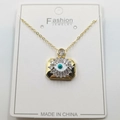 Gold evil eye rectangular pendant necklace with turquoise center on white jewelry card - Rectangular Style C / Pendant And Chain With Packaging