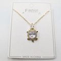 Gold sea turtle pendant necklace with oval crystal and sparkling rhinestones on card - White Zirconia Turtle Pendant + Chain + Packaging
