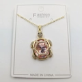Golden turtle pendant necklace with a faceted pink gemstone and micro-set white zircon - Pink Zirconia Turtle Pendant + Chain + Packaging