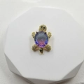 Golden turtle pendant with a large purple-blue gradient gemstone and sparkling crystals - Purple Zircon Turtle Pendant