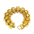 Dettaglio del bracciale a catena con teschi dorati, occhi di strass e chiusura a moschettone - Oro Gemma Gialla